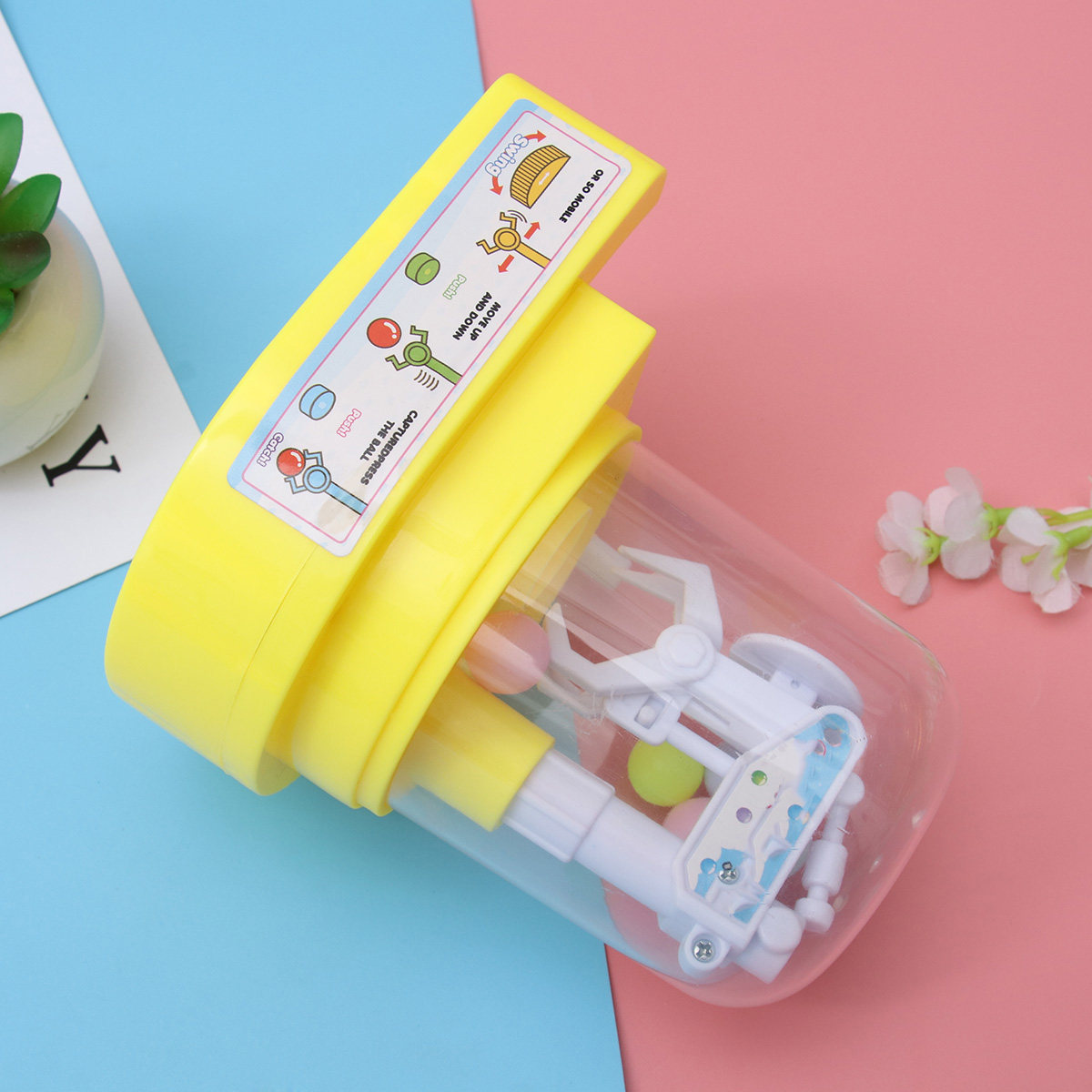 1個入りキャンディグラバーマシンクレーン、高級プラスチック製 - Claw Crane Machine のレビューと価格